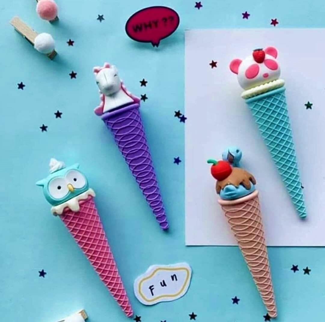 Assorted set of four whimsical ice cream cone erasers, including an owl, blue swan, pink unicorn, and strawberry-topped bear, displayed in a retail box by Usmile Toys. www.usmile.toys